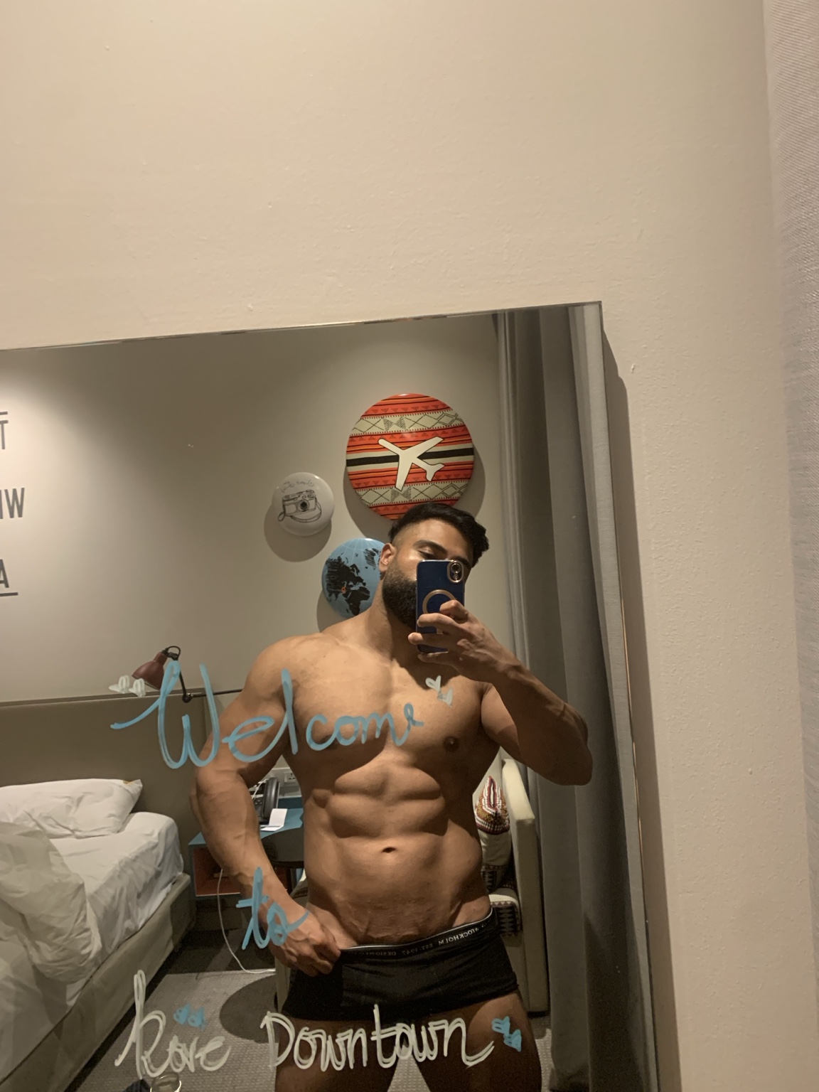 GURU physique progress in a mirror portrait