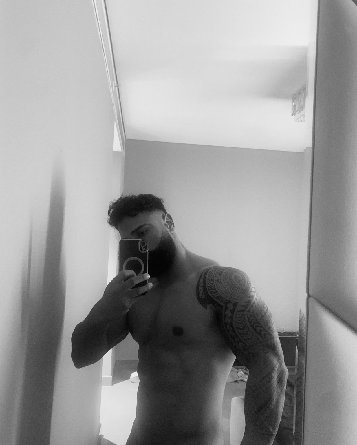 Black-and-white portrait of GURU showing his training progress